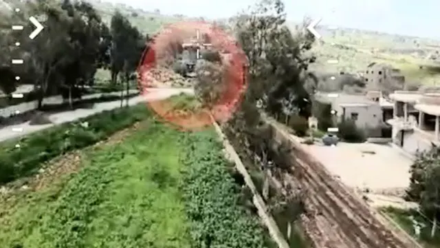 D9 engineering vehicle on the road between Taybeh and Deir Siryan (dive drone)