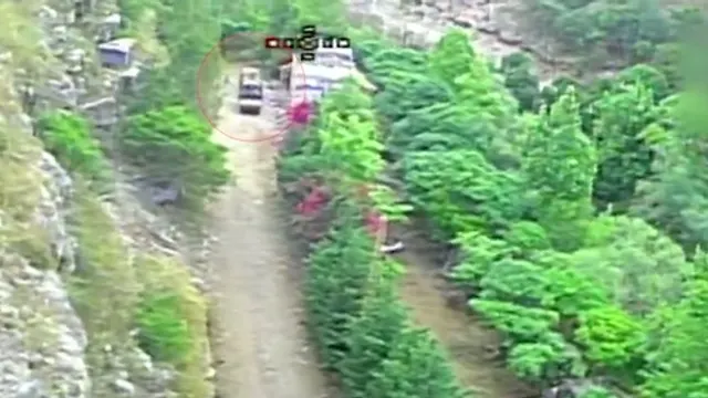Military Hummer at the riverbed, Zawtar al-Sharqiyah (Ababil dive drone)