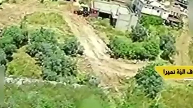 Soldier gathering + "Namera" vehicle, southern outskirts of Zawtar al-Sharqiyah (Ababil dive drones)