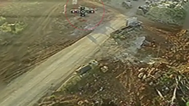 "Namera" troop carrier, newly established Hamamis Hill site opposite Khiam (Ababil dive drone)
