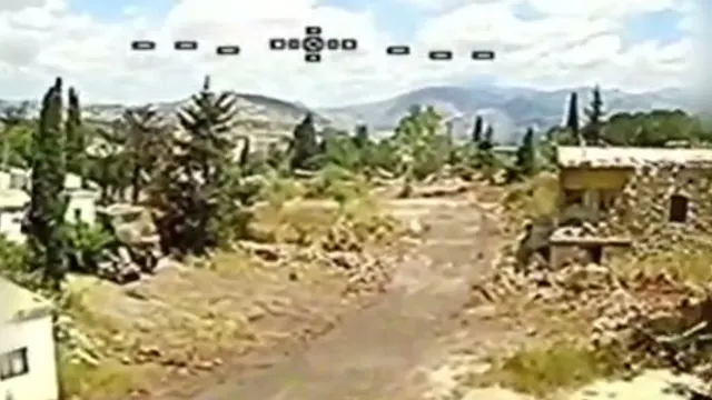 Israeli army engineering vehicle, outskirts of Arnoun (Ababil dive drone)